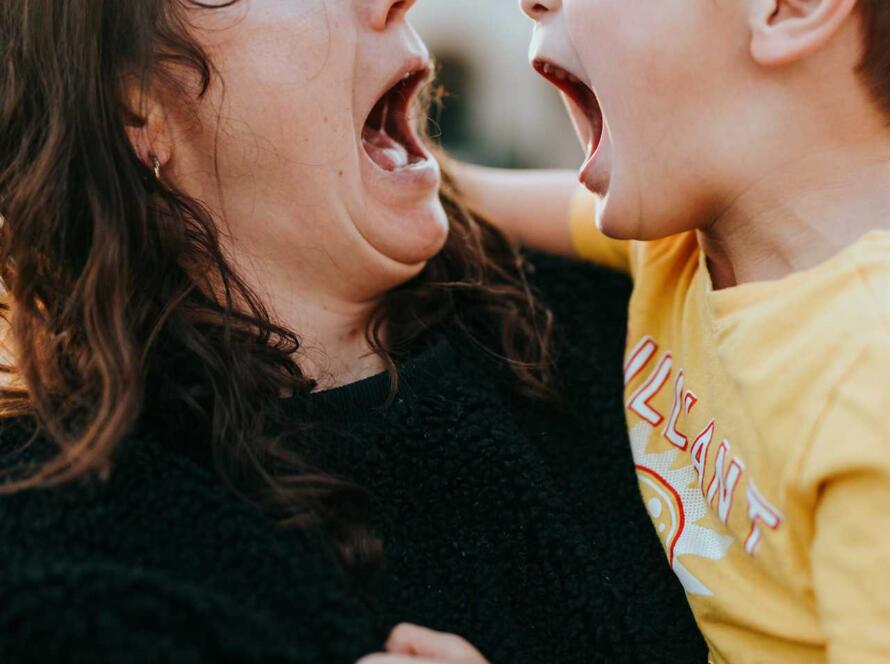 A woman and her son yelling at each other.